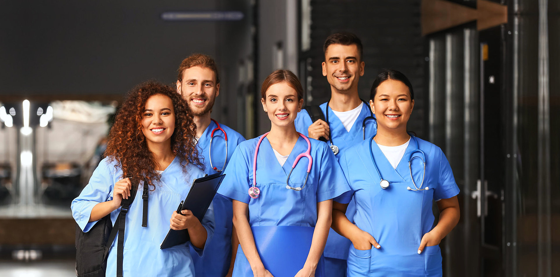 group of nurses smiling together